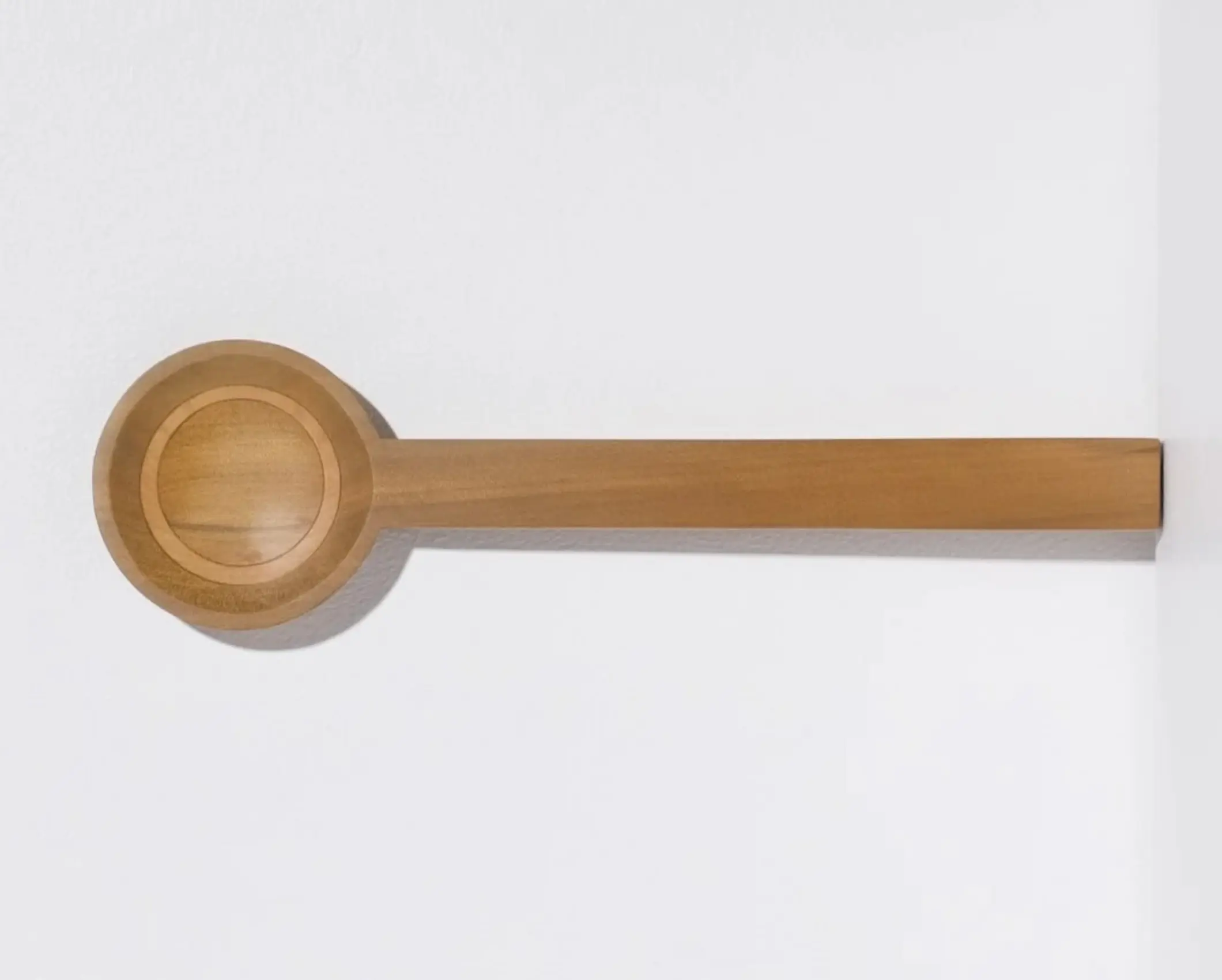 A hand carved inset spoon from Courtney Petleys 100 piece series hand made in Aotearoa, New Zealand