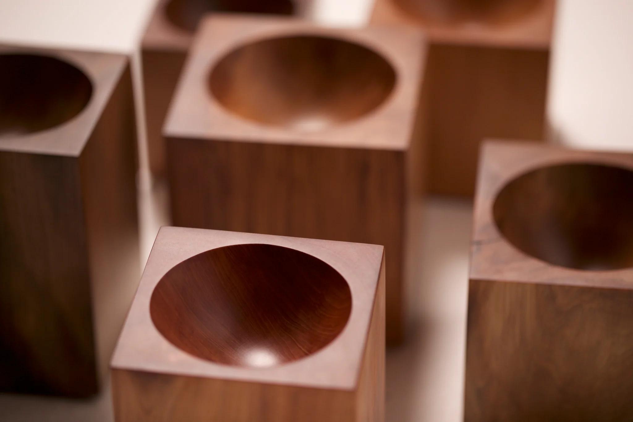 A group of Courtney Petleys Hemisphere hand carved bowls made from Local New Zealand timbers.