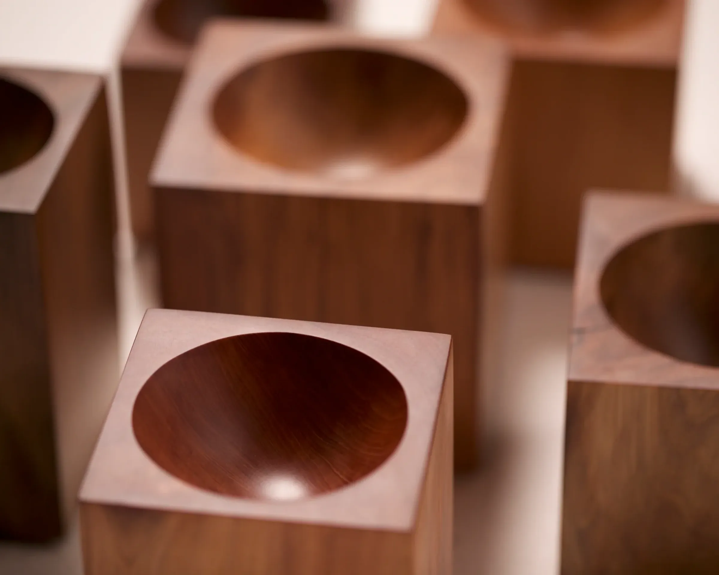 A group of Courtney Petleys Hemisphere hand carved bowls made from Local New Zealand timbers.