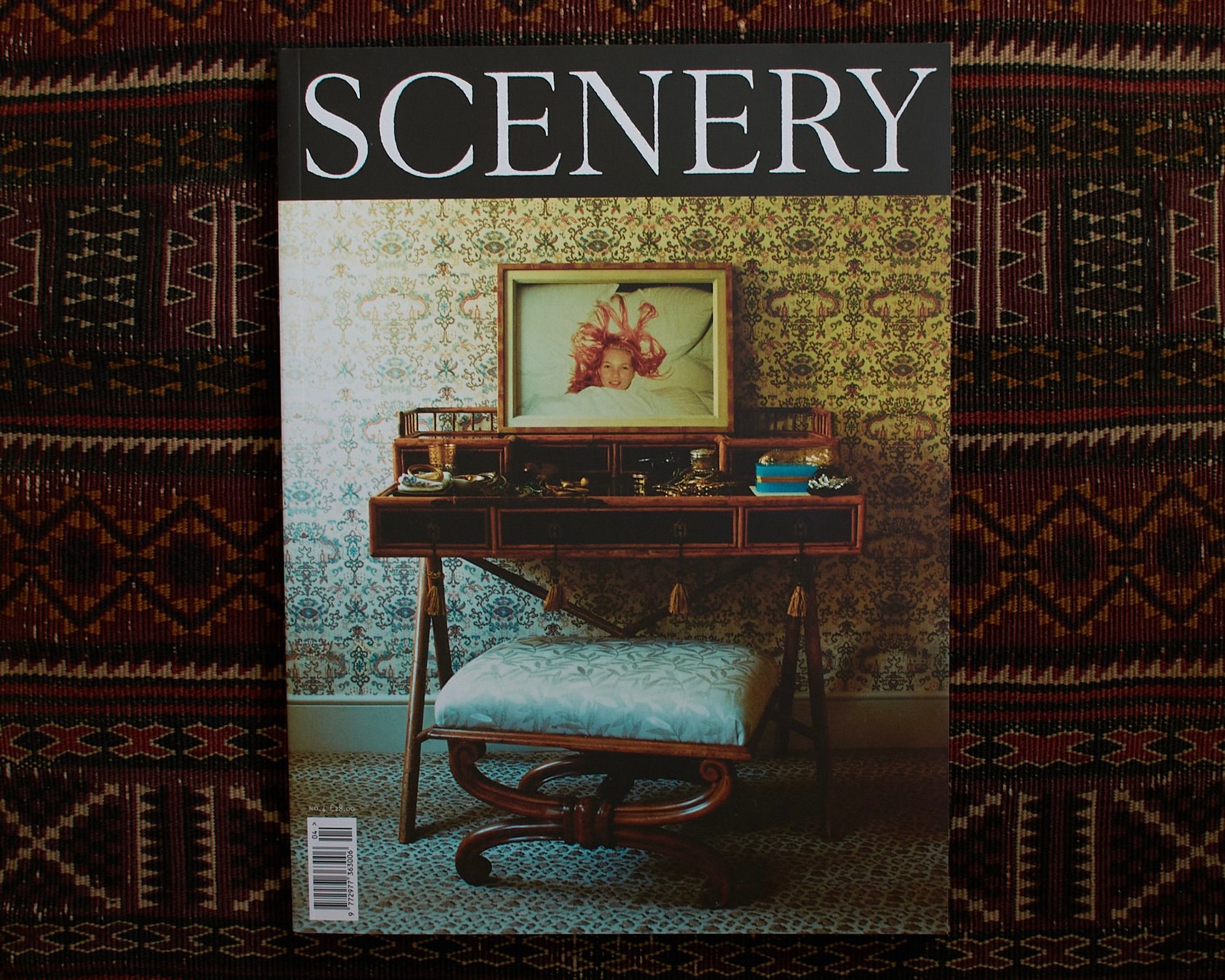 Scenery Magazine photographed in a flat lay on a kilim carpet 