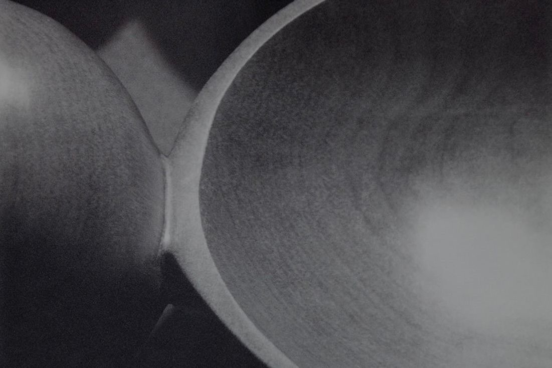 a close up detail of a hand carved moon spoon by New Zealand wood worker, Courtney Petley