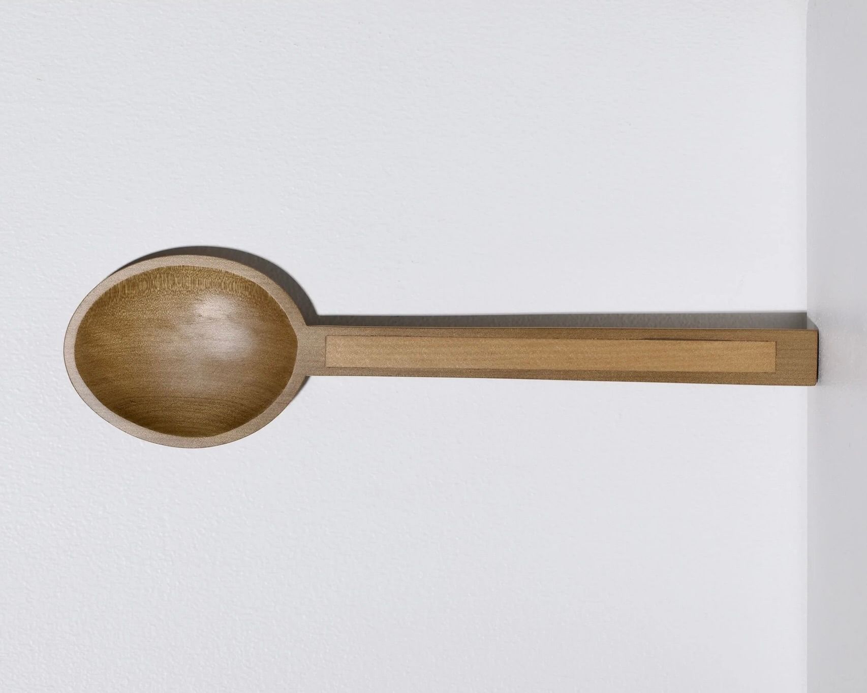 A hand carved inset spoon from Courtney Petleys 100 piece series hand made in Aotearoa, New Zealand