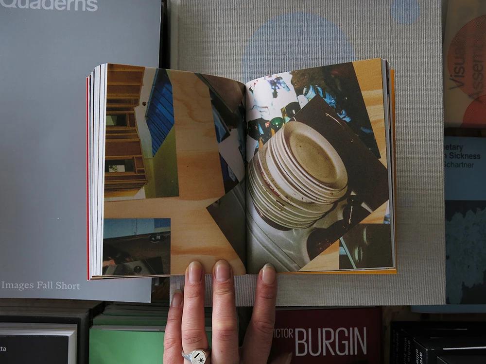 On Making Less by Rirkrit Tiravanija open to a photographic spread featuring stacked ceramic plates and an interior workspace.