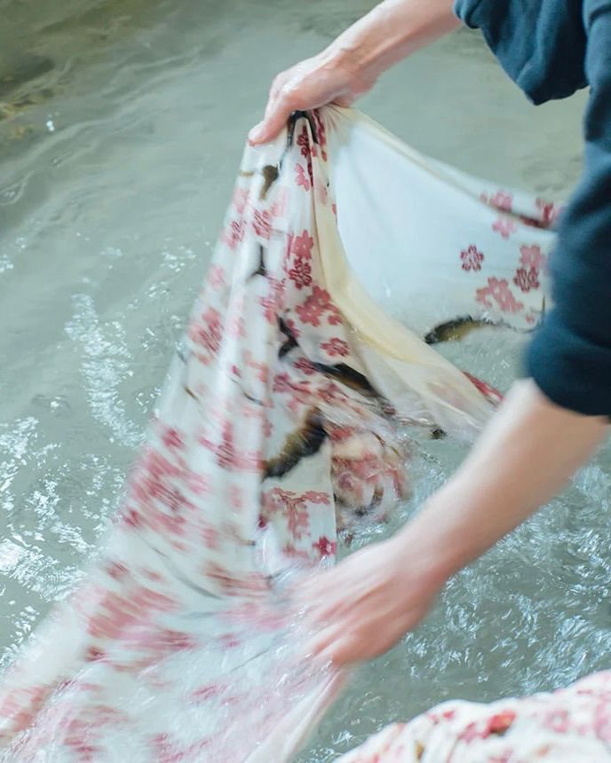 washing Tengui textiles in water 