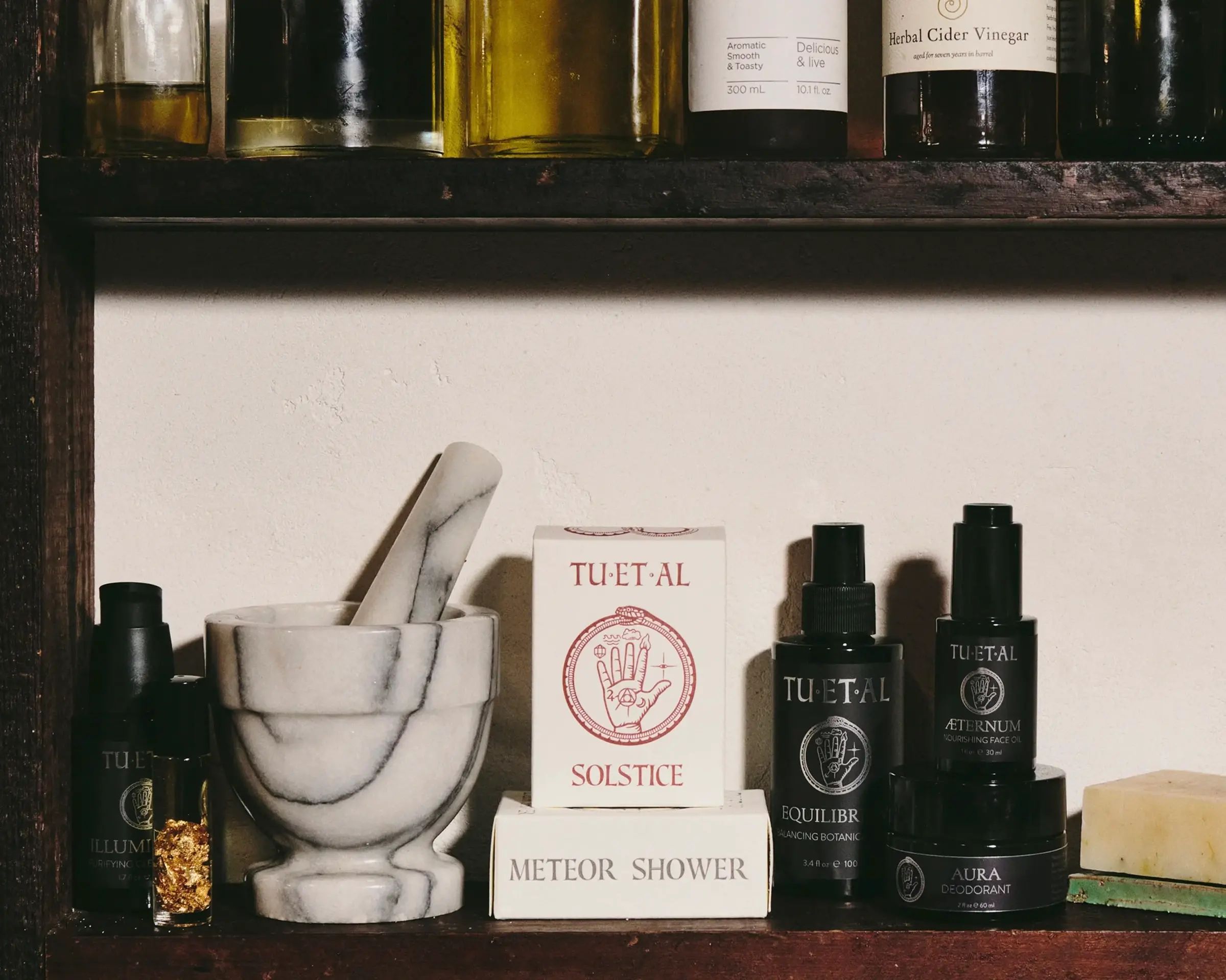 skincare on a bookshelf