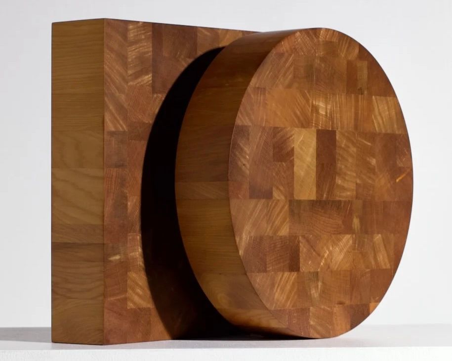 A pair of Courtney Petleys round and square end grain chopping boards made from Swamp Kauri in Auckland New Zealand