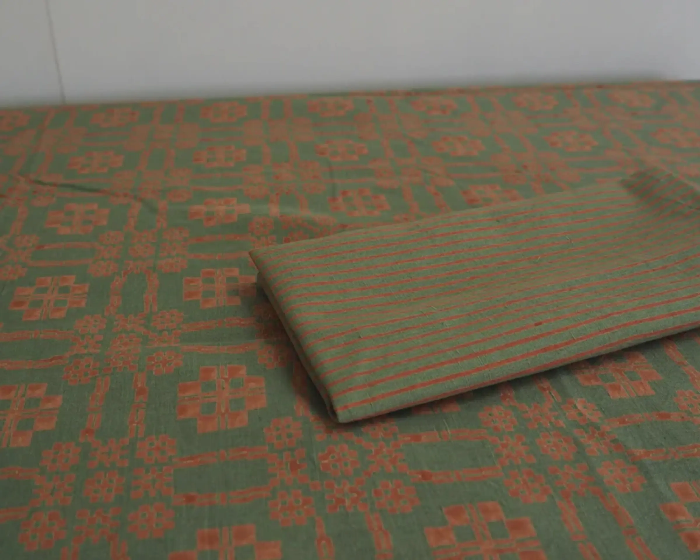 studio fords stripe sequoia napkin on a table