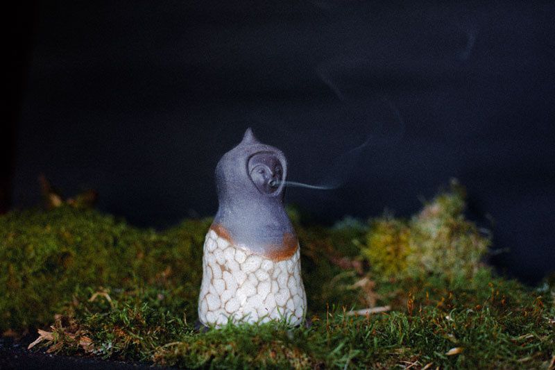 Ceres No.1 ceramic incense burner on a mossy bed with a dark background