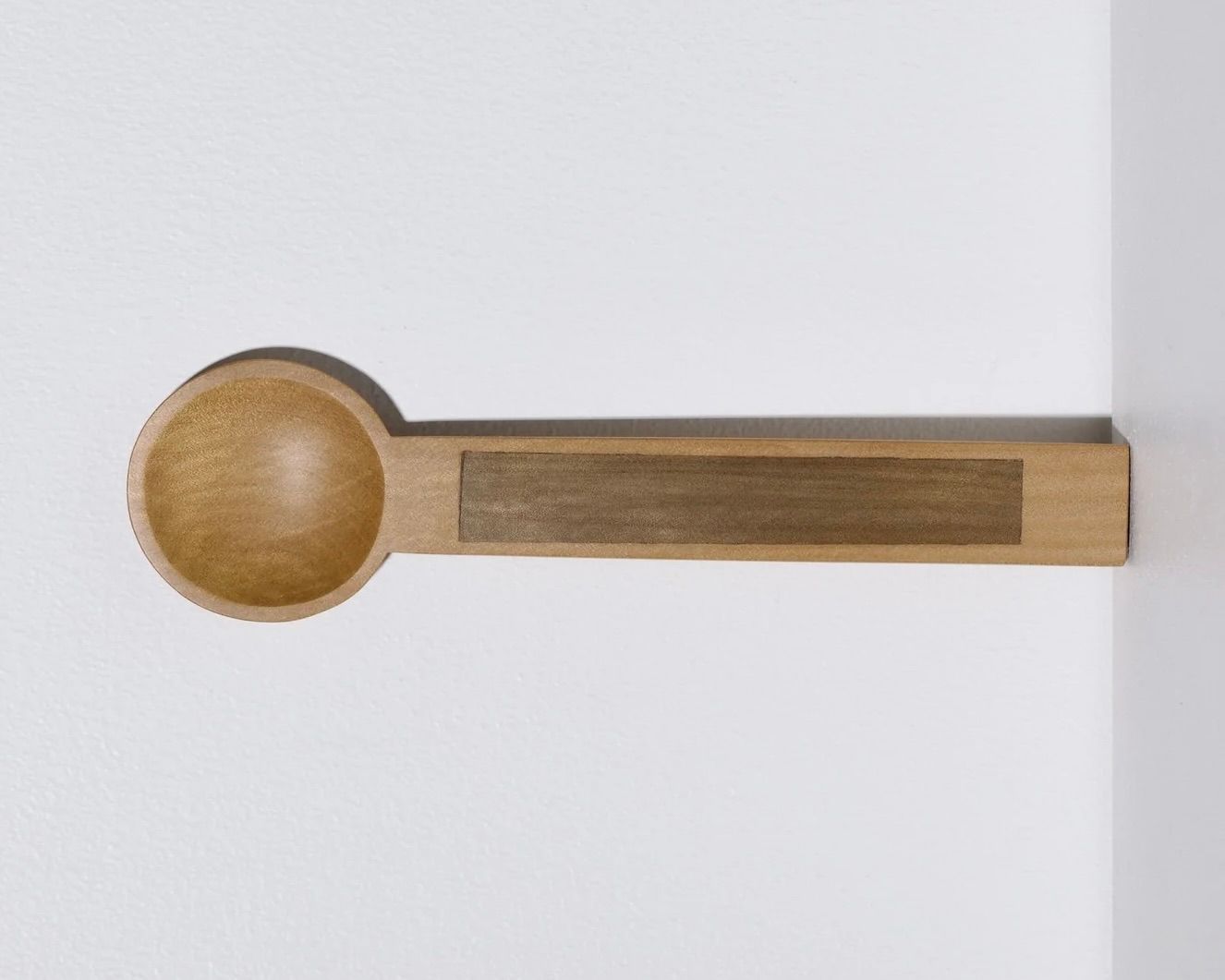 A hand carved inset spoon from Courtney Petleys 100 piece series hand made in Aotearoa, New Zealand