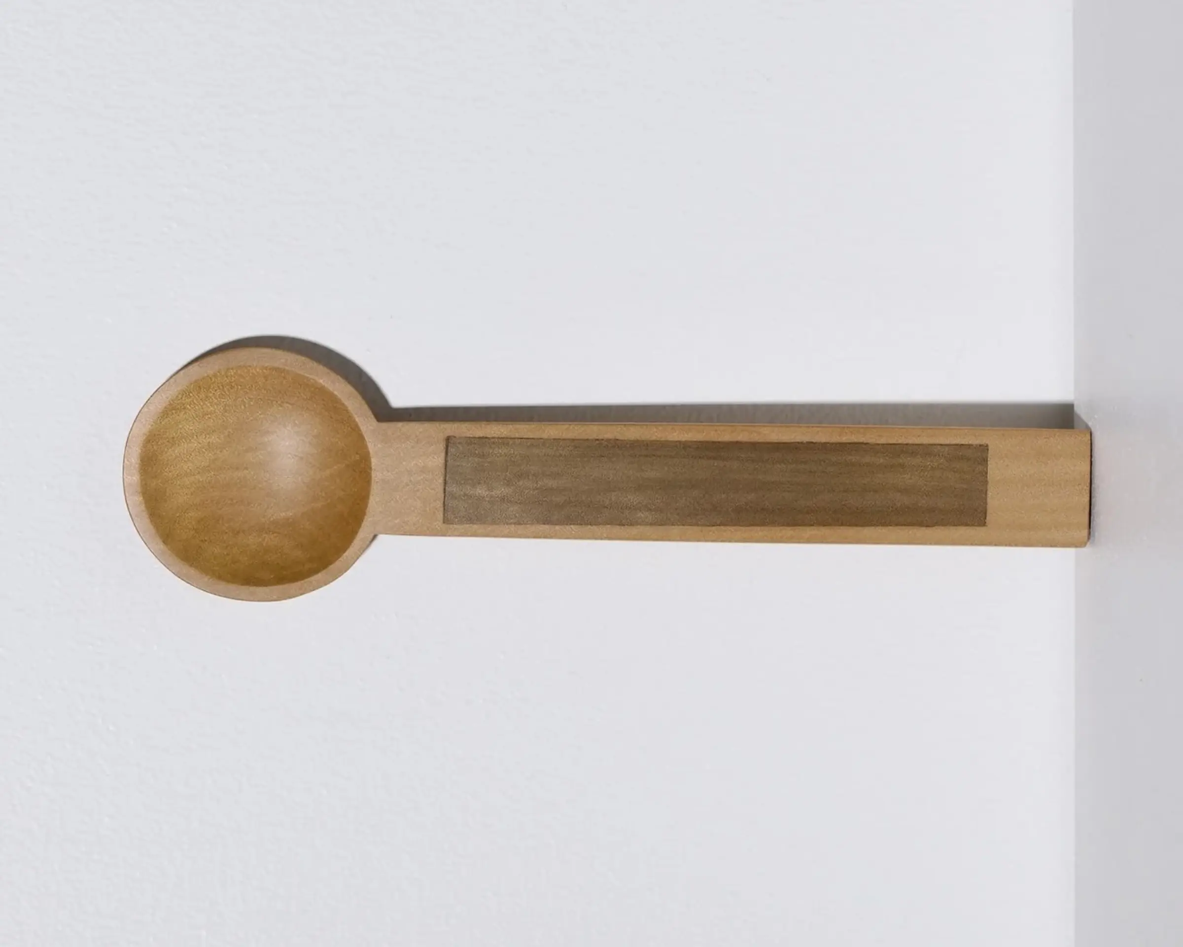 A hand carved inset spoon from Courtney Petleys 100 piece series hand made in Aotearoa, New Zealand
