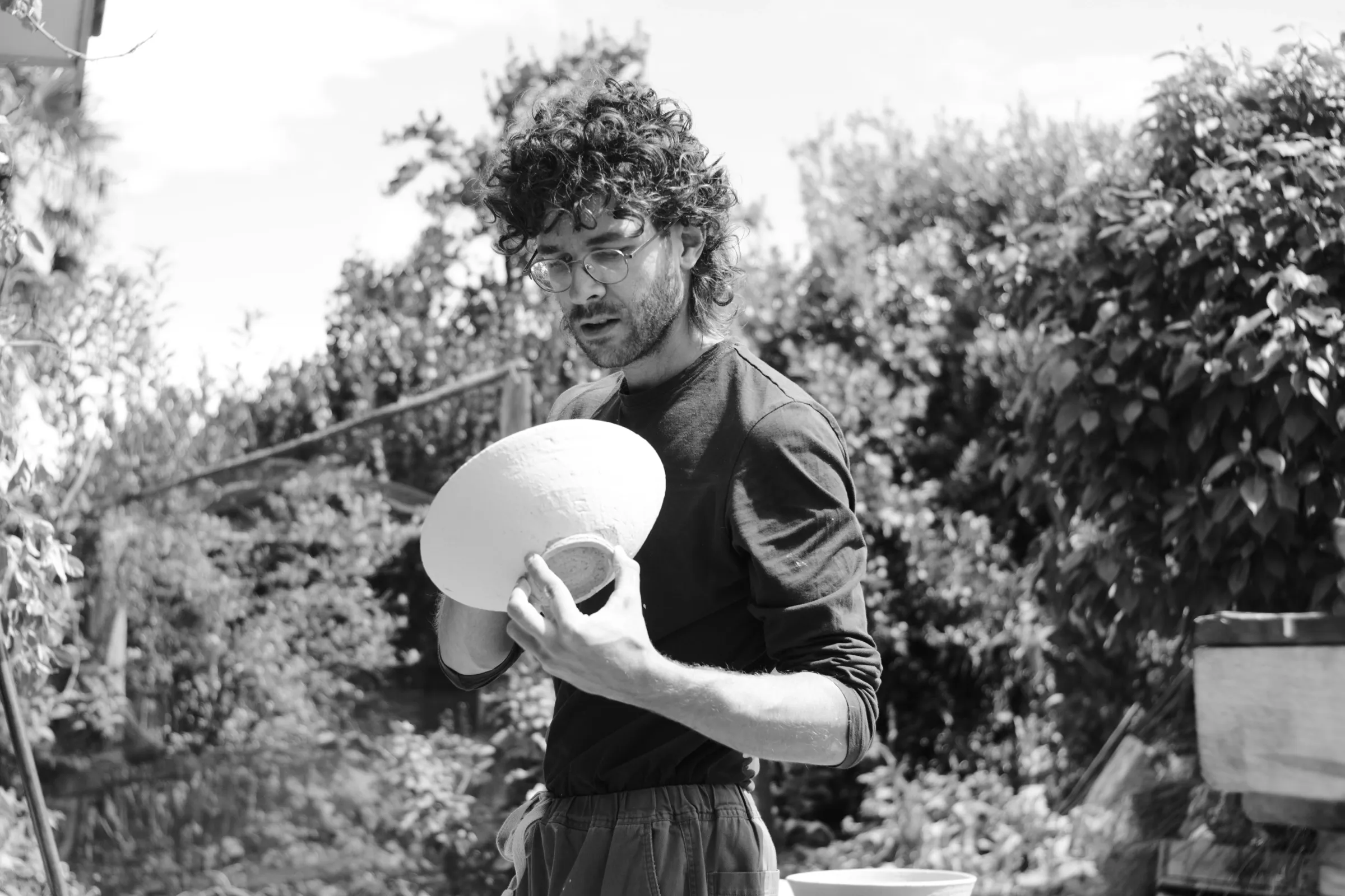 Scott Brough holding one of his clay bowls