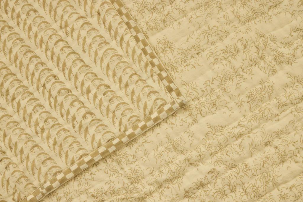 a close up of the harlequin quilt from studio ford