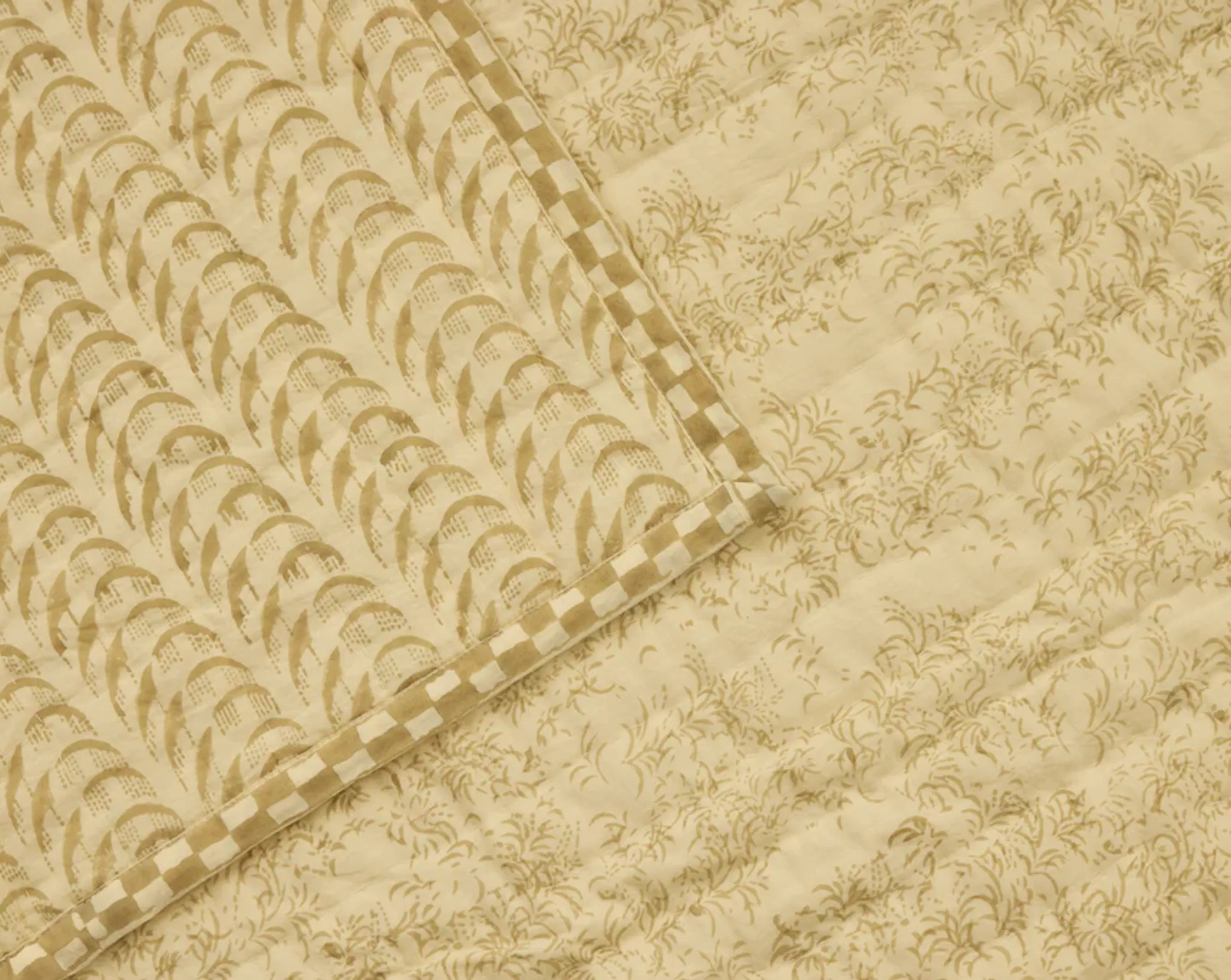 a close up of the harlequin quilt from studio ford