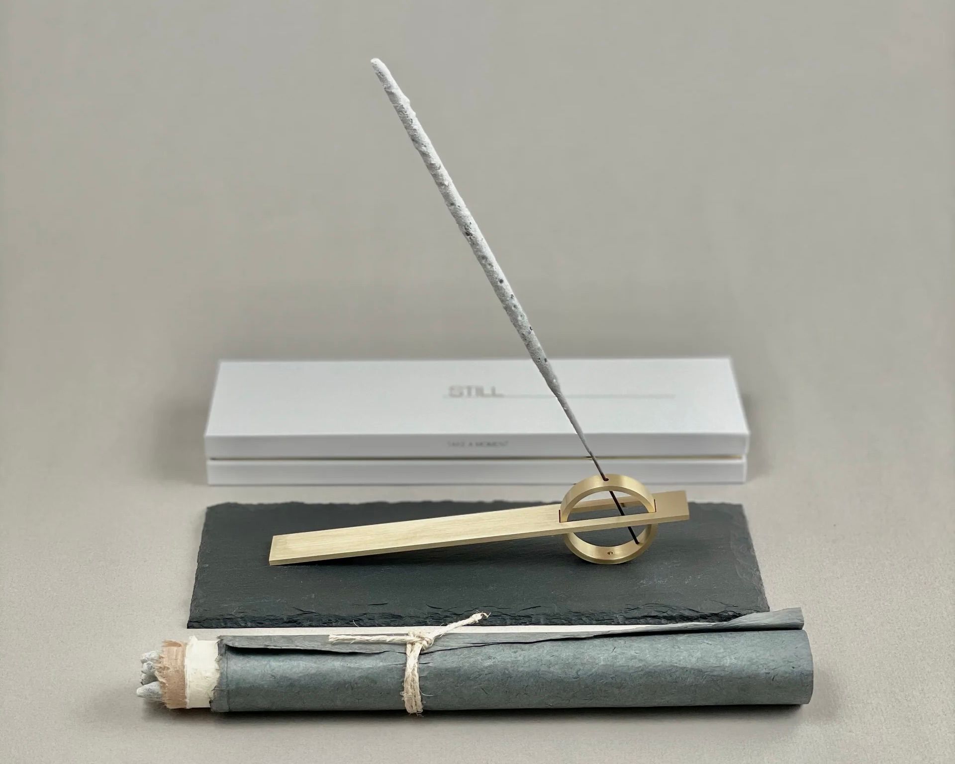 copal incense styled on a brass holder 