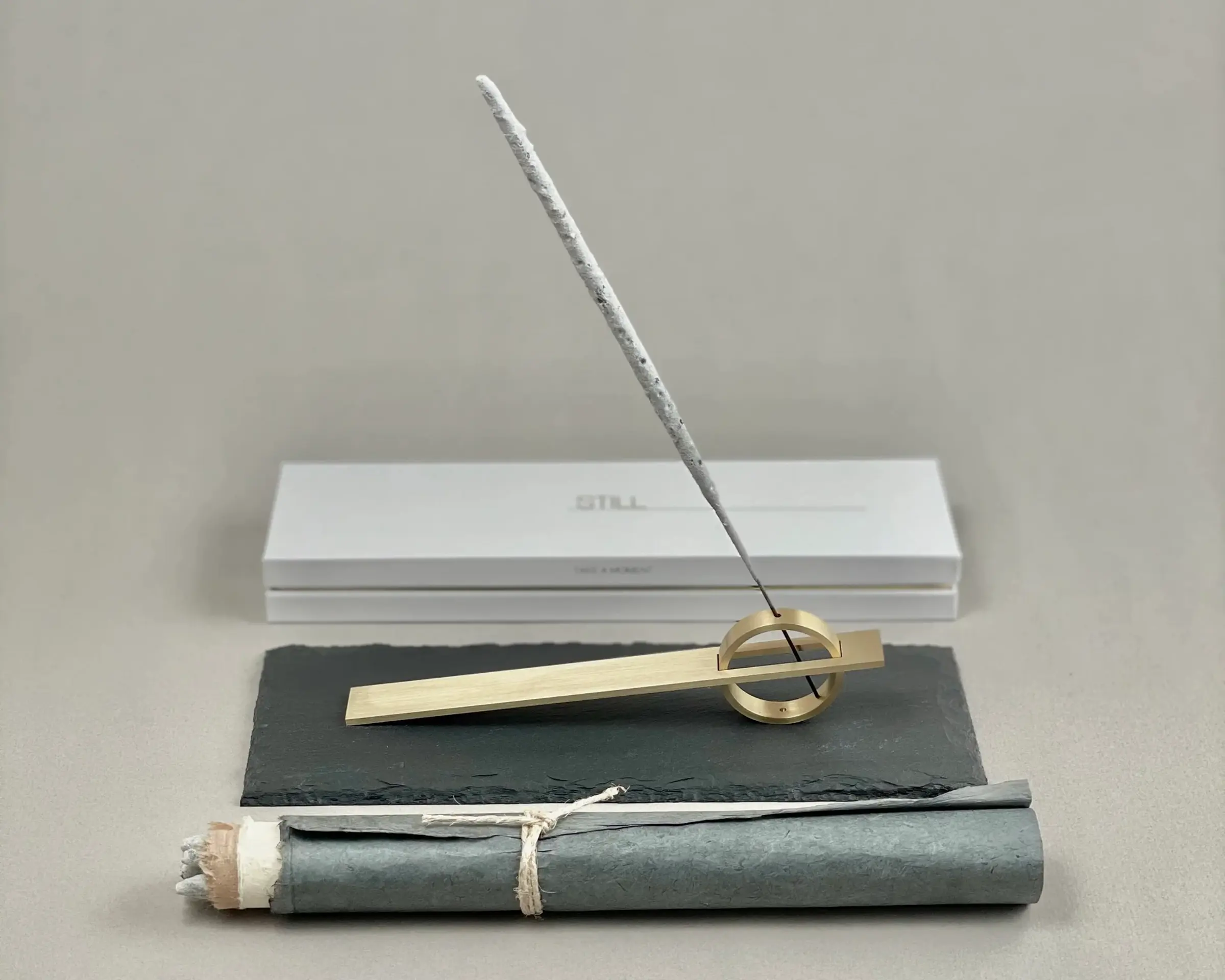 copal incense styled on a brass holder