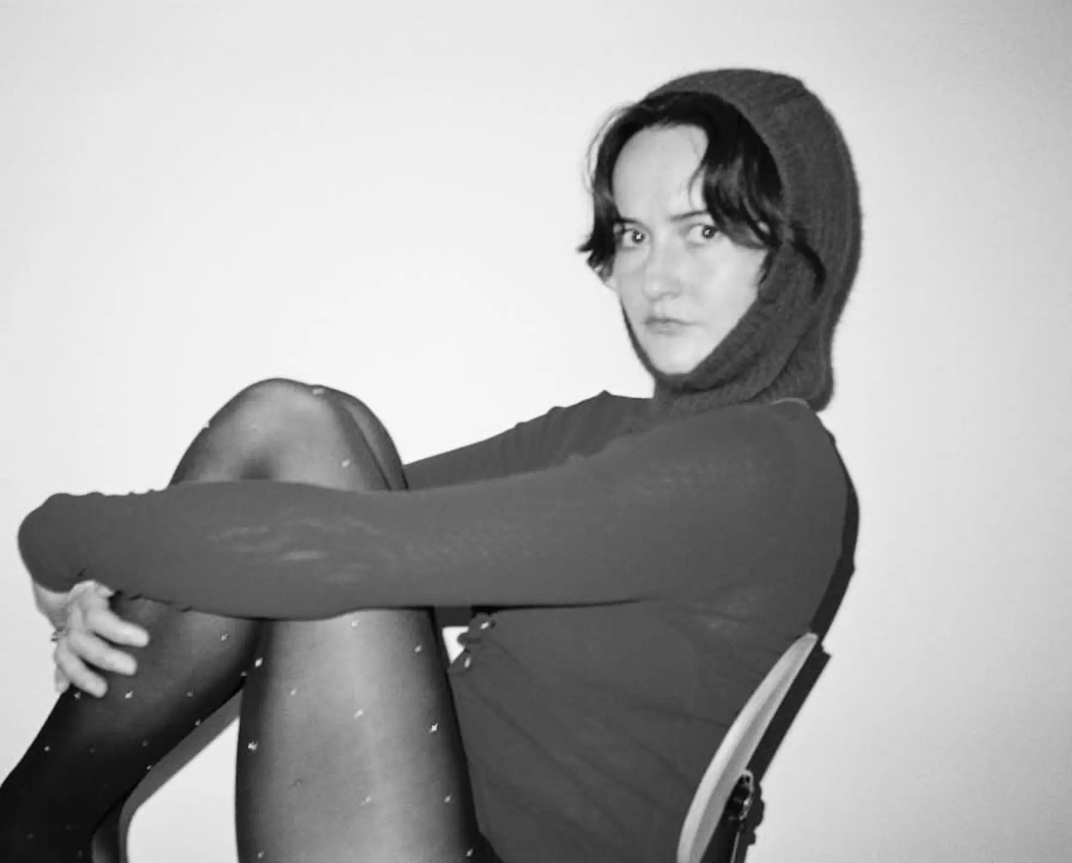 Woman wearing a Bonnie Wore Balaclava, hand knitted in New Zealand from premium possum merino.