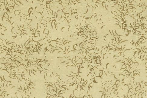A close up shot of the Studio Ford harlequin tablecloth with buttery colours hand block printed on a linen cotton blend fabric