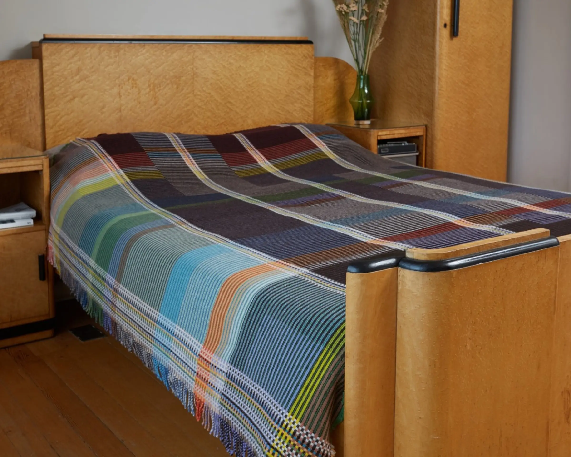 wool blanket covering a bed
