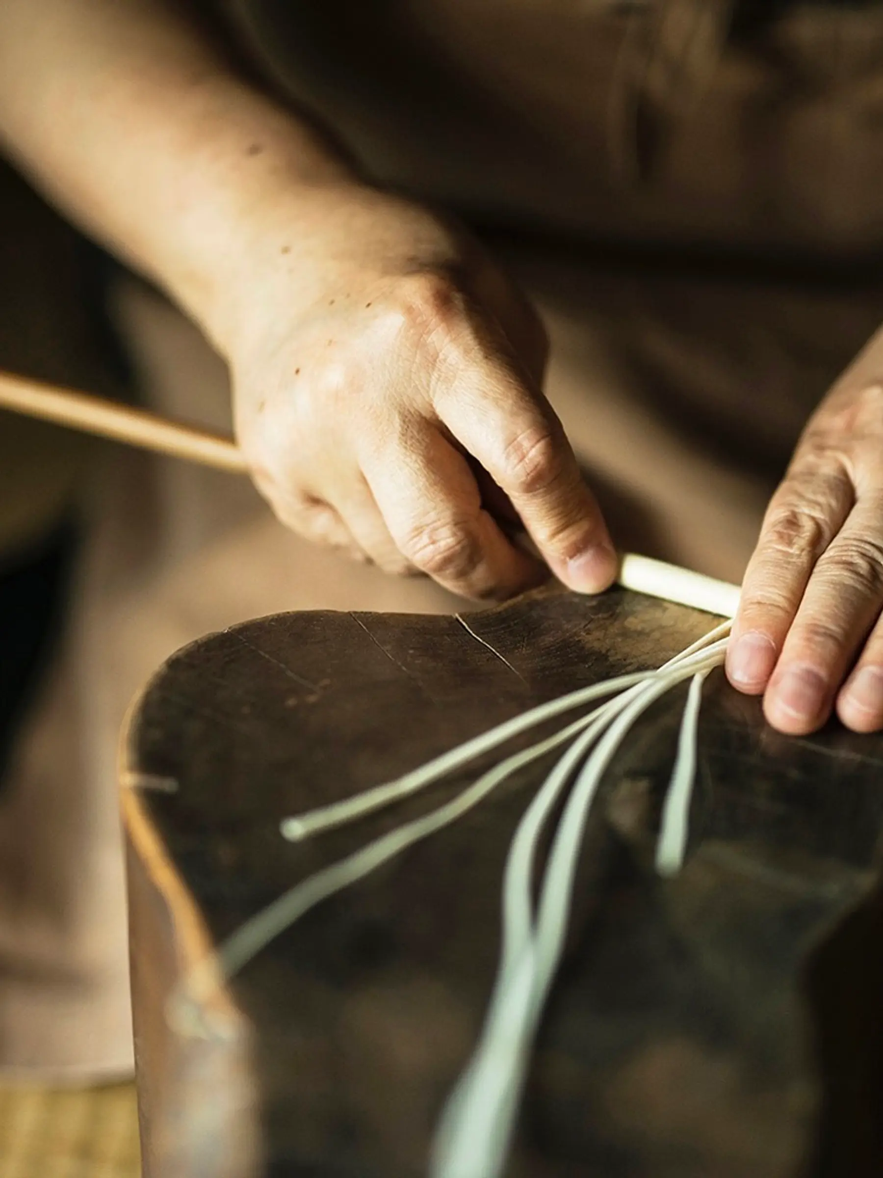 Making sumac wax candles by hand