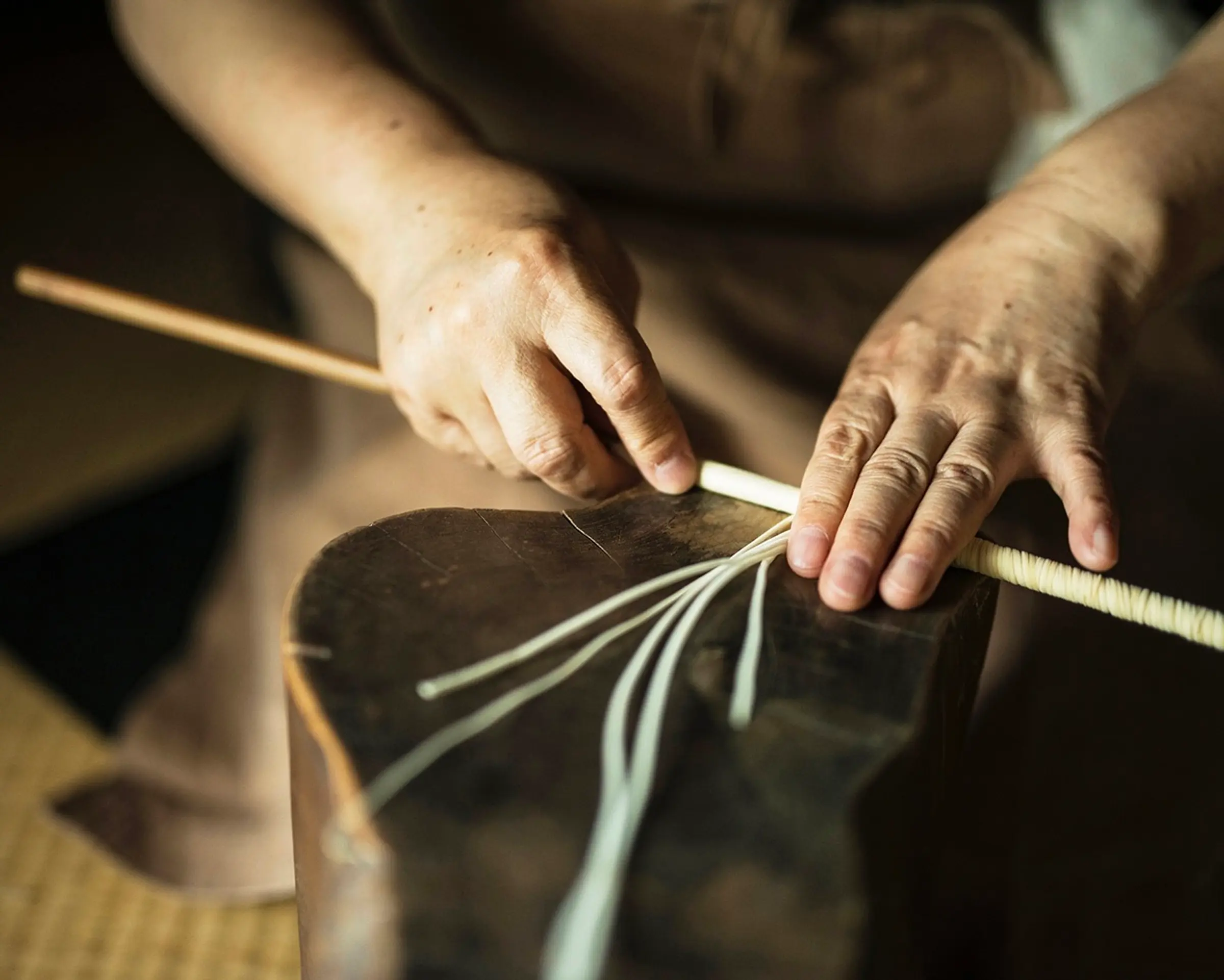 Making sumac wax candles by hand