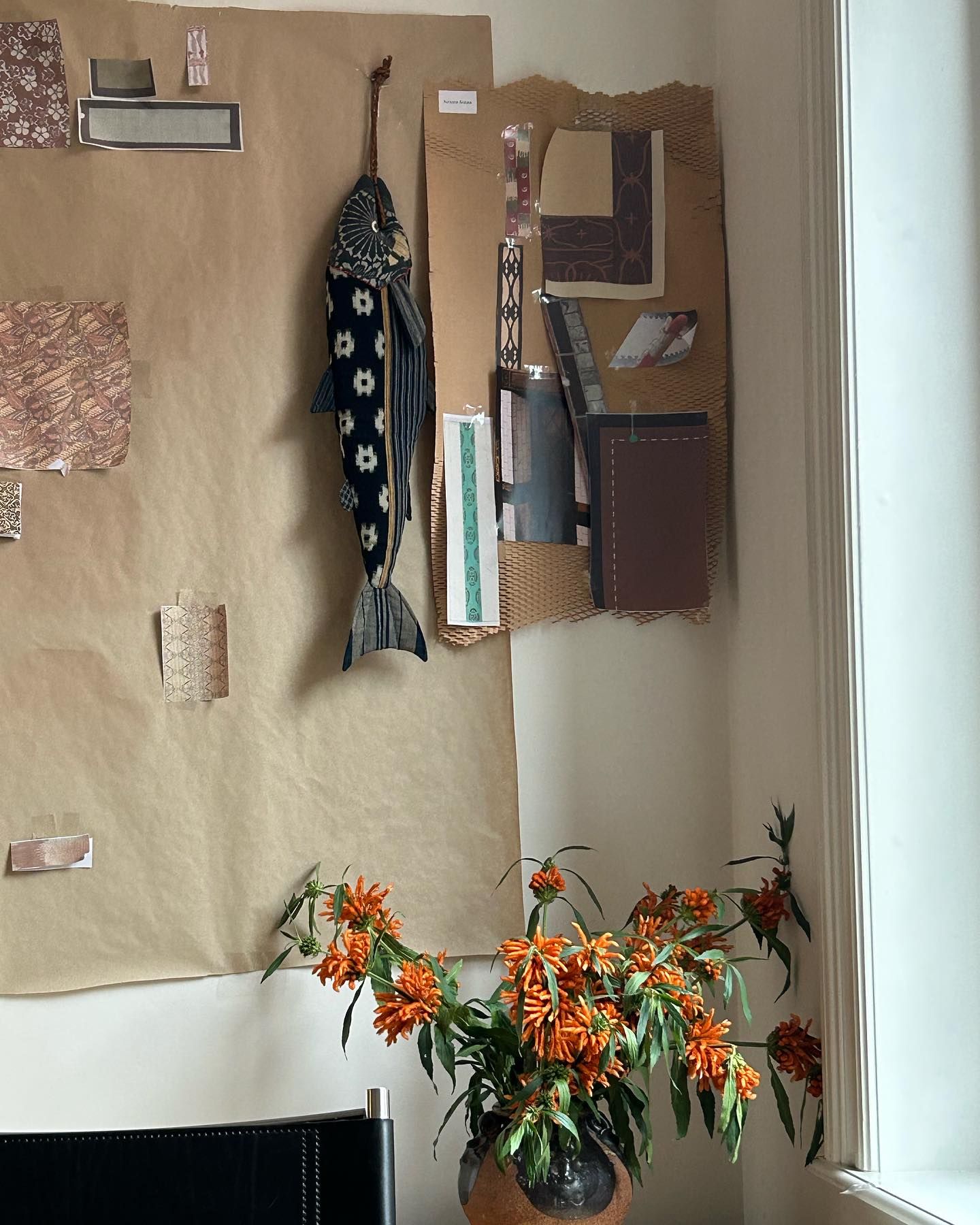 image of the autumn sonata studio wall with samples and colour swatches 