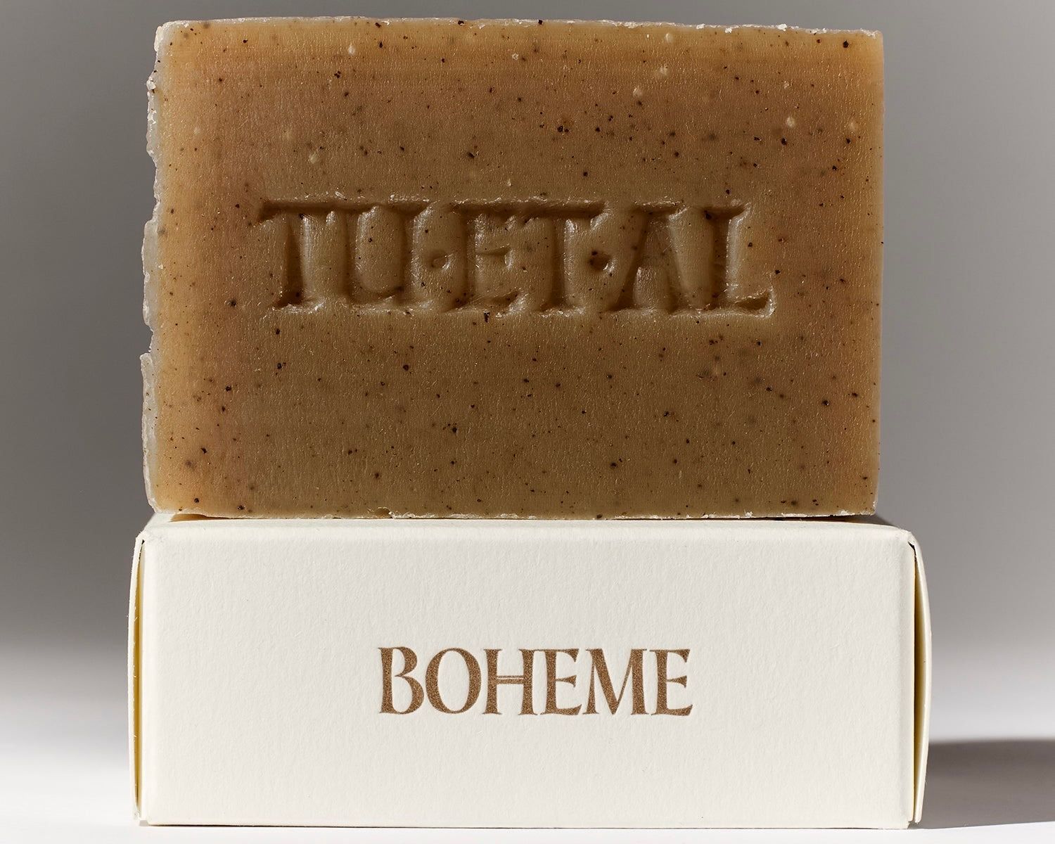 Tuétal Boheme cold process bar soap handcrafted with coffee, botanical oils and woody essential oils in a warm caramel-coloured bar.