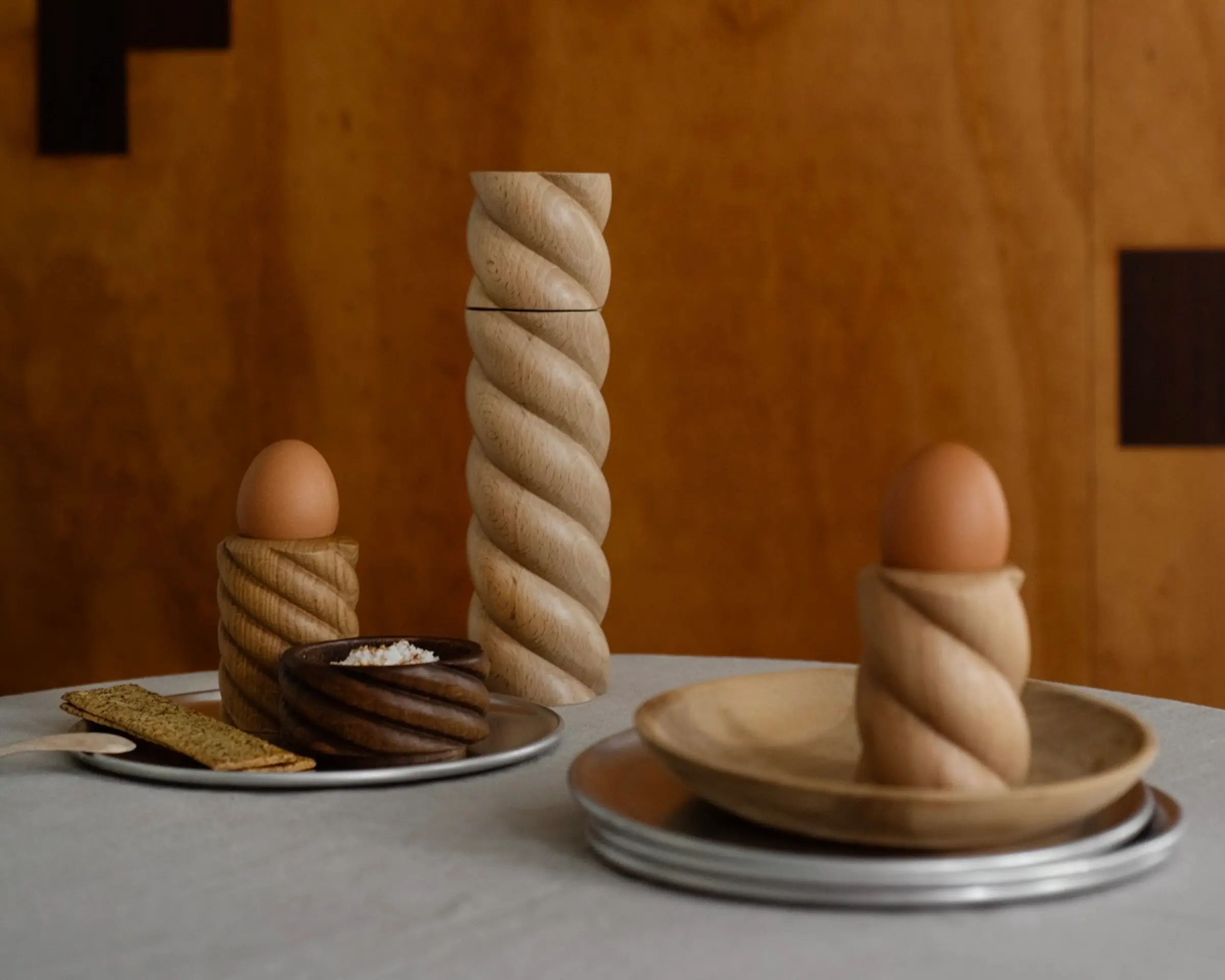 OROs torsade collection of wooden kitchen pieces on a dining table