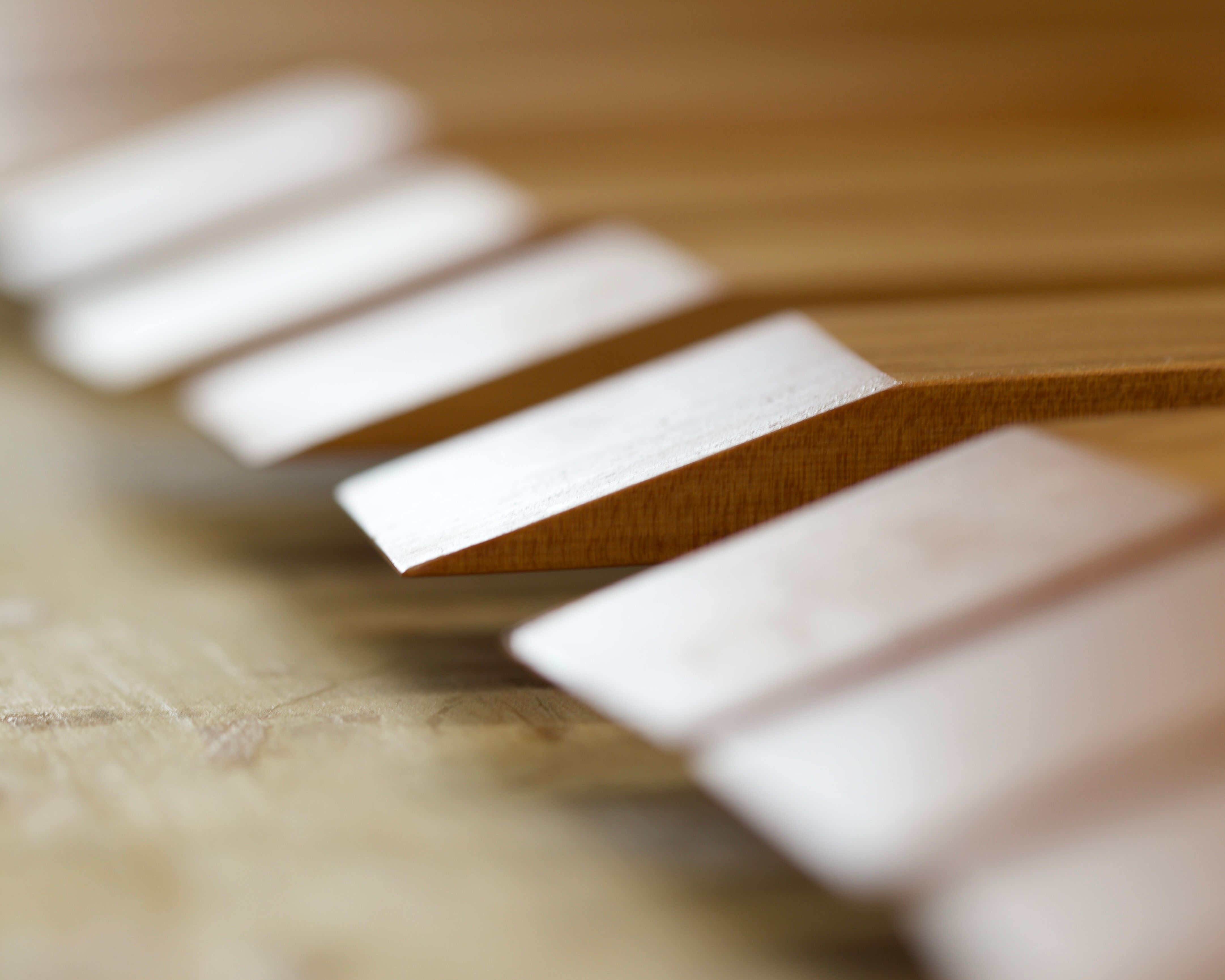 A close up detail of Courtney pelters mini spatula edge hand carved in New Zealand from matai wood