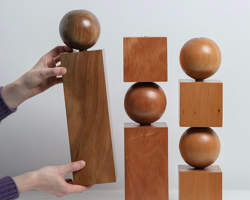 a trio of New Zealand woodworker Courtney pelters Moon series candle holders, hand made from native timbers