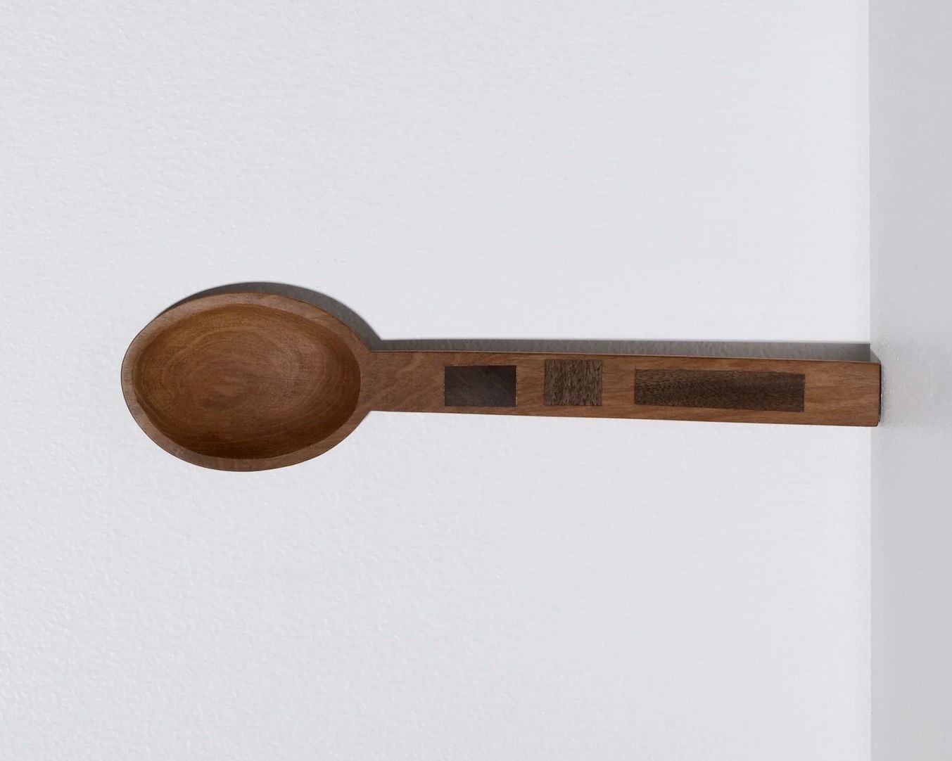A hand carved inset spoon from Courtney Petleys 100 piece series hand made in Aotearoa, New Zealand