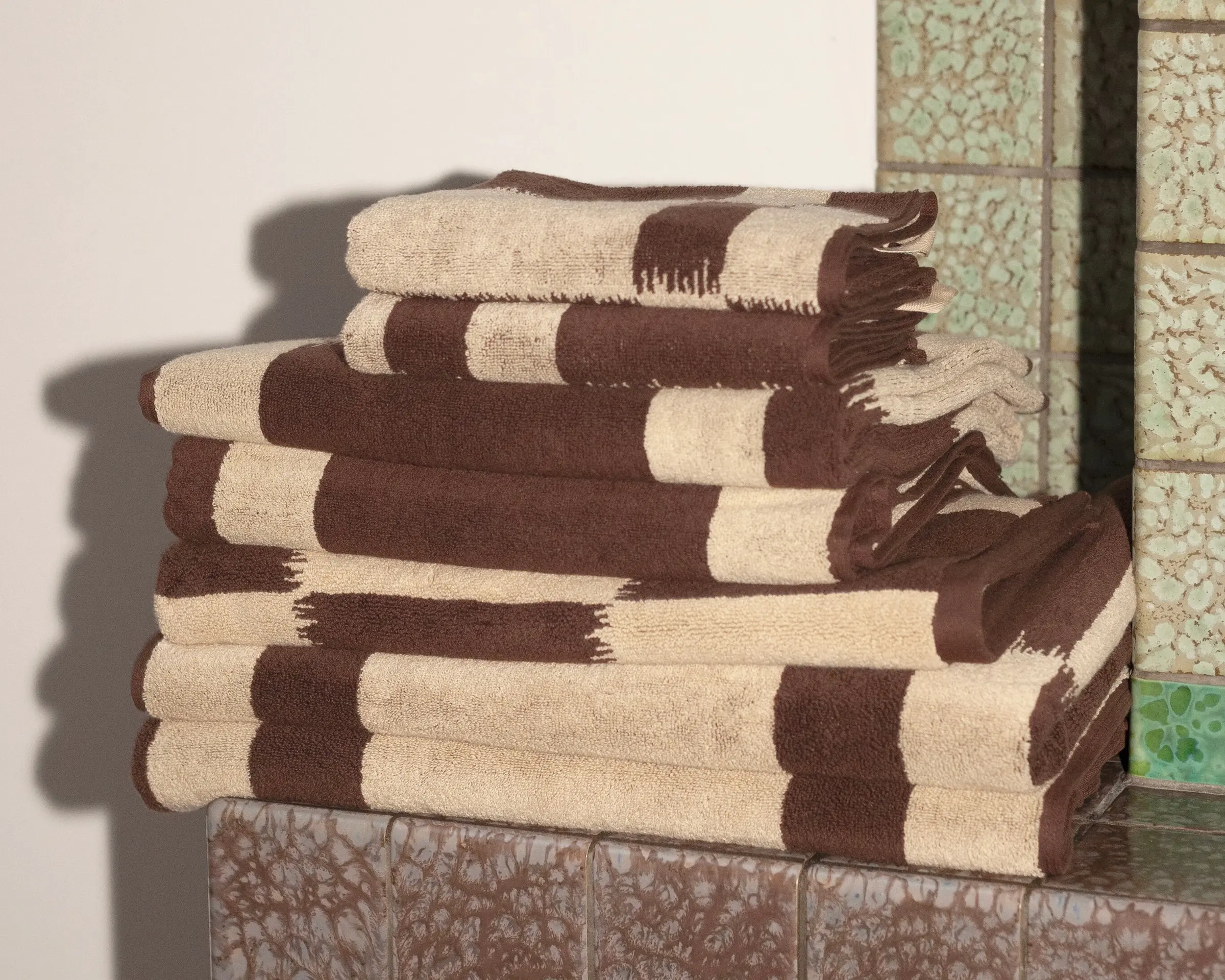 Karin Hand Towel folded on a mantel