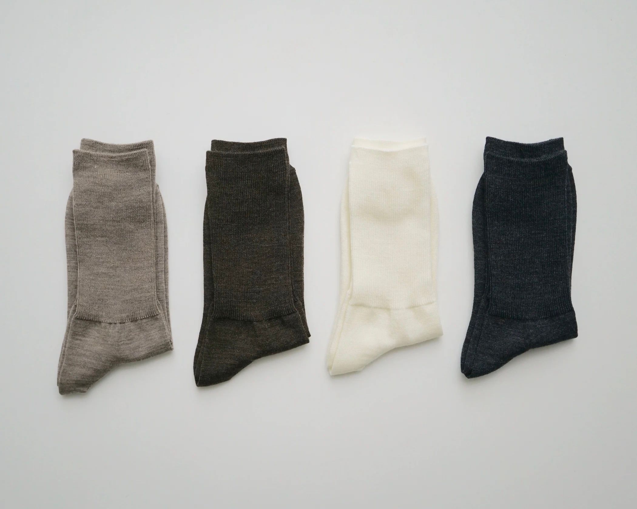 a line up of merino wool ribbed socks from Hakne