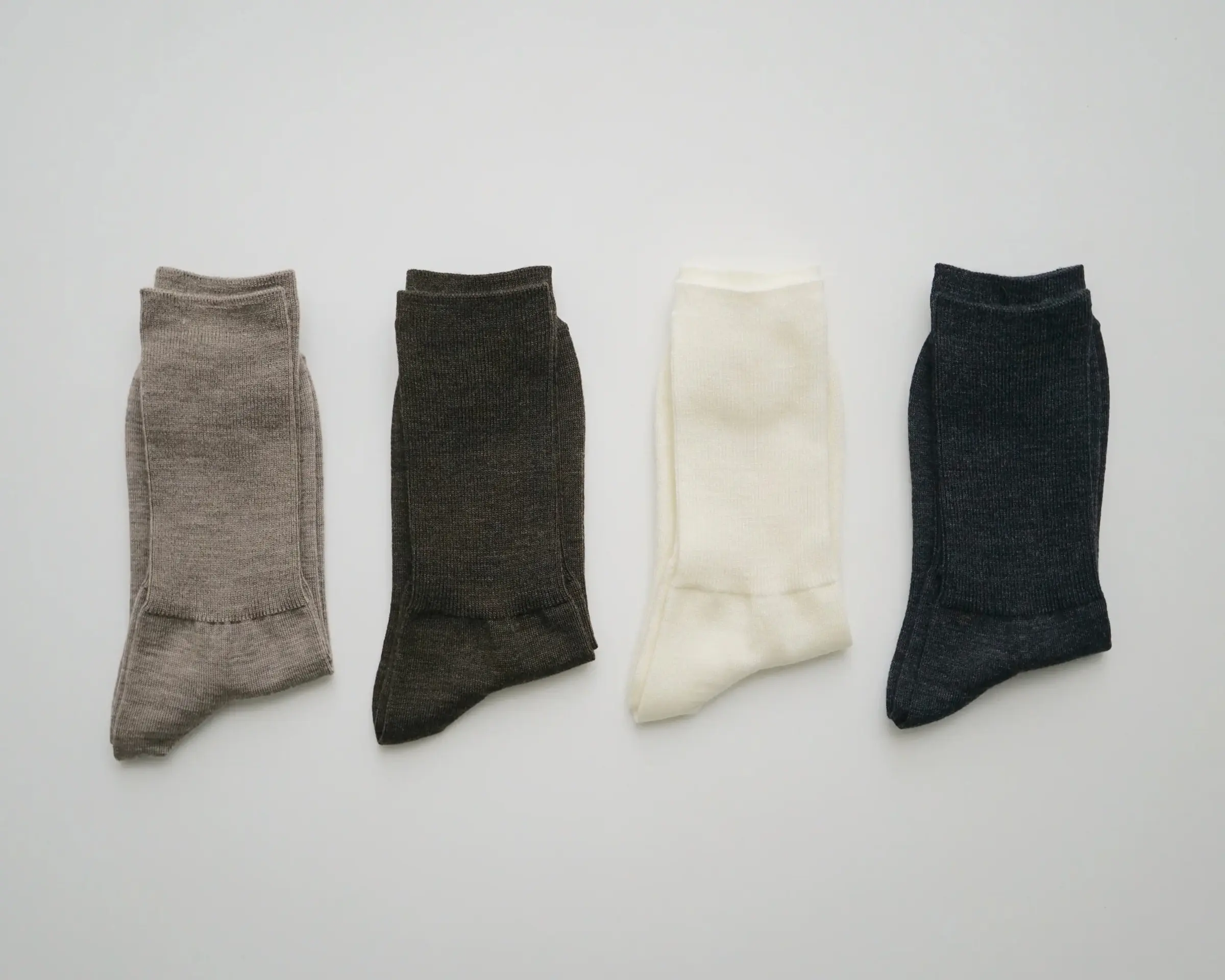 a line up of merino wool ribbed socks from Hakne