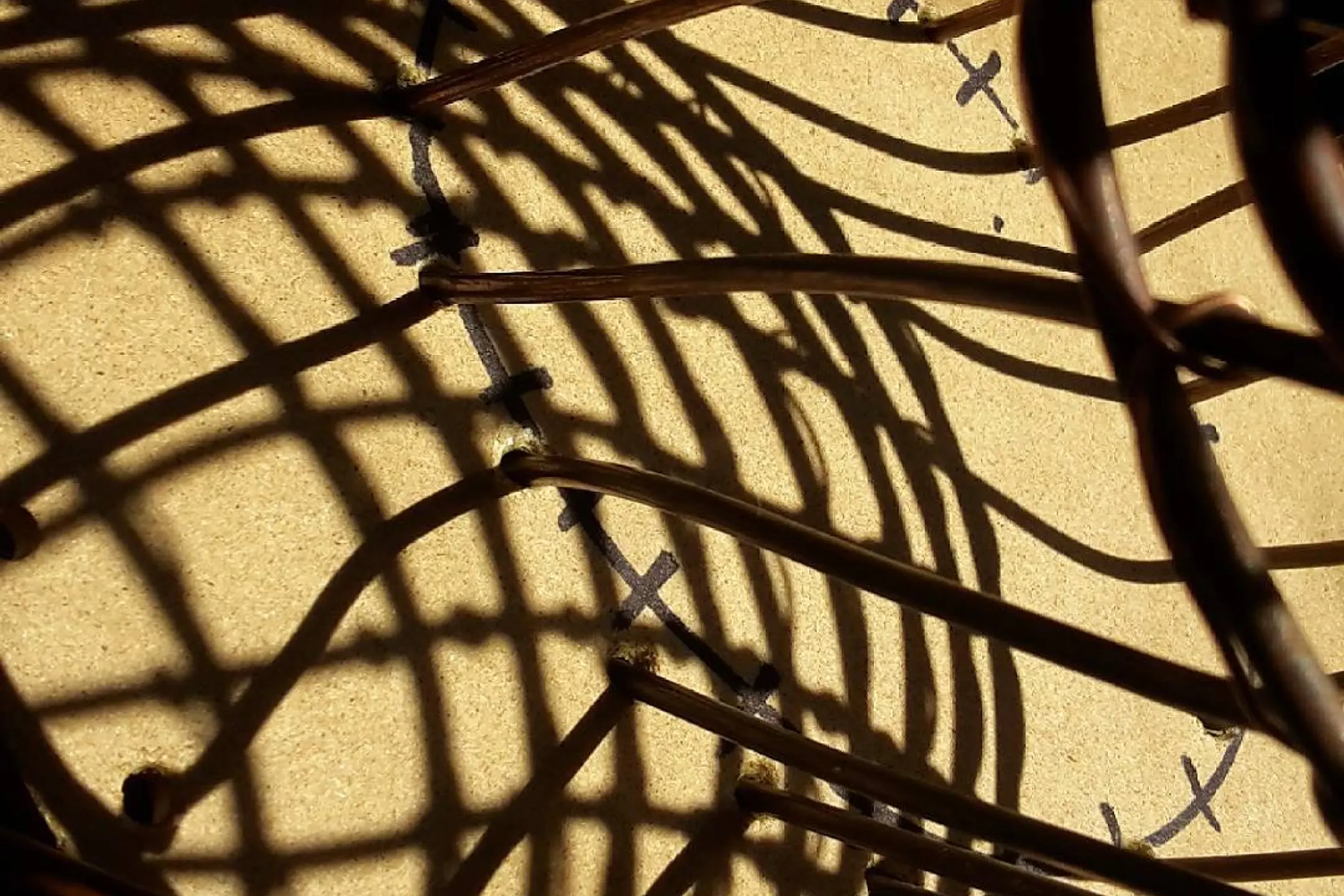 detail photo of a copper weaving sculpture