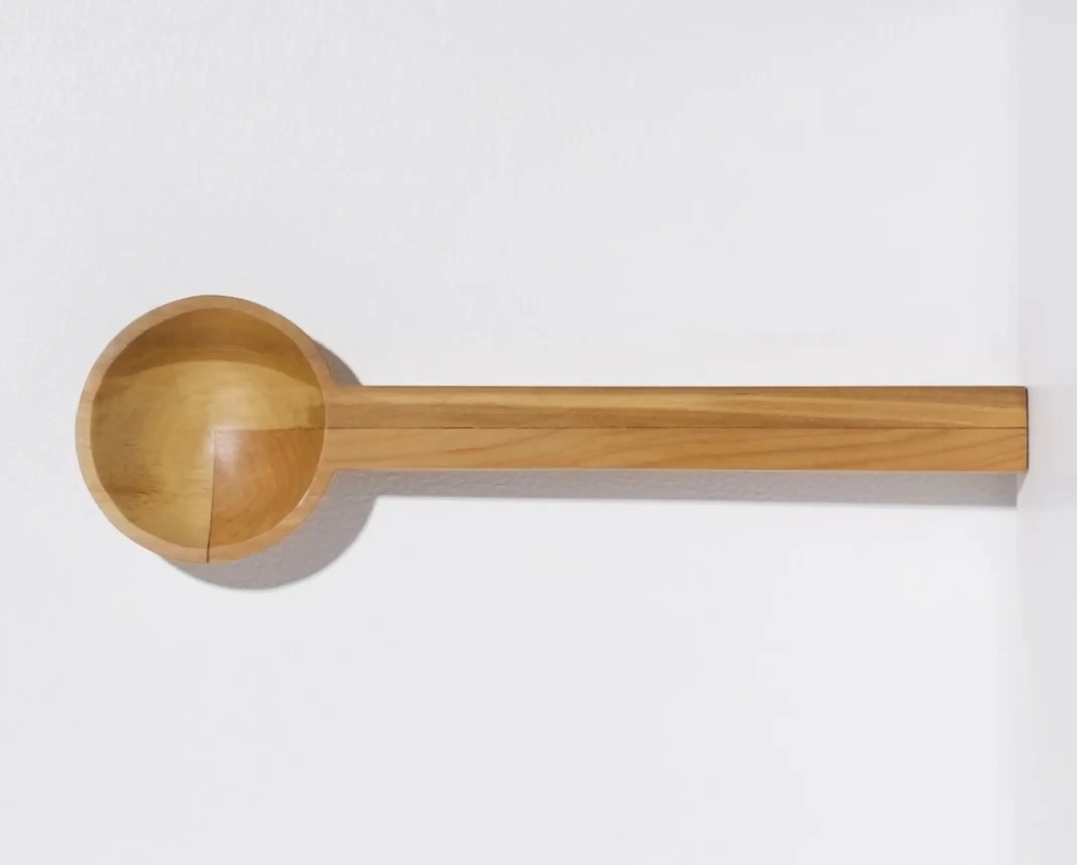 A hand carved inset spoon from Courtney Petleys 100 piece series hand made in Aotearoa, New Zealand