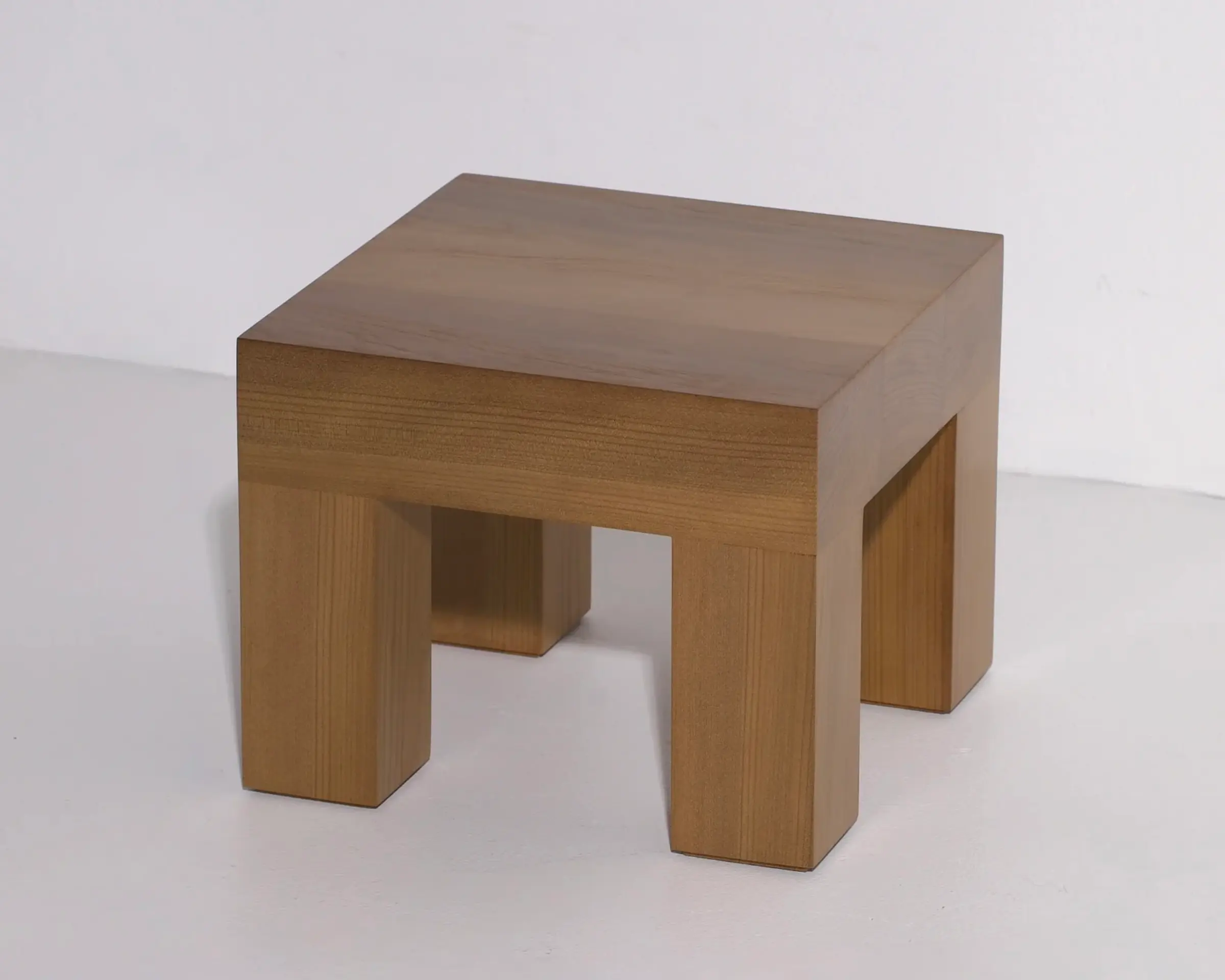 A blue swamp kauri stool Hand made by New Zealand wood worker Courtney Petley