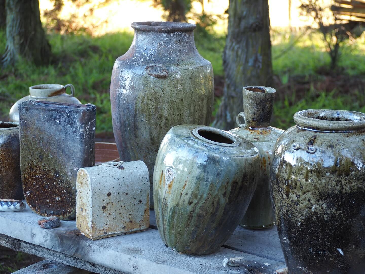A collection of ceramics by Holly rose Morgan, Anagram wood fired pieces outside on a table top