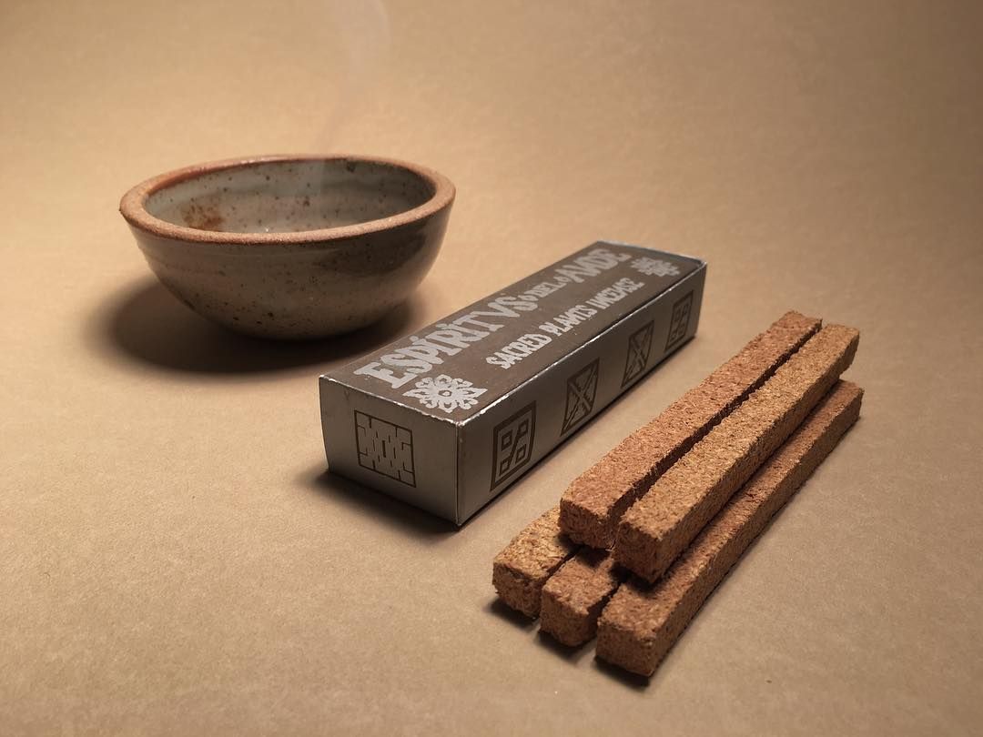 Pure palo Santo incense bricks from Incausa on a beige background