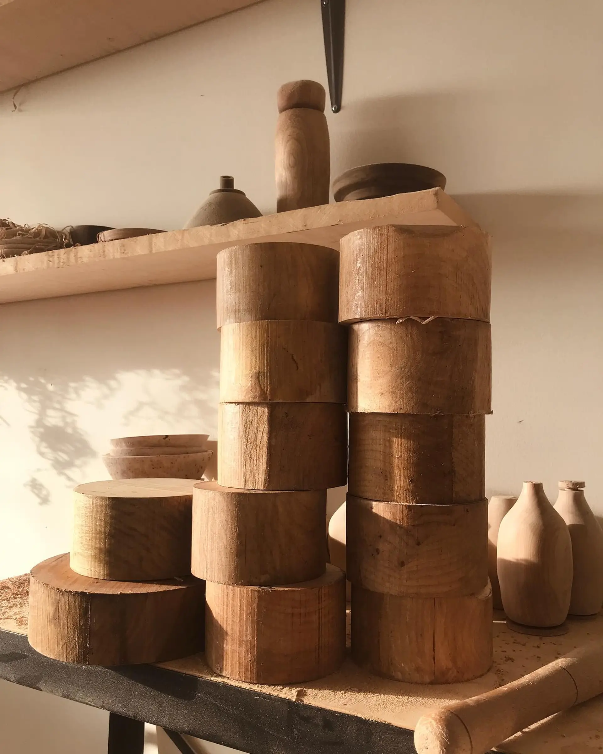 raw pieces of wood ready to be carved into bowls and home decor objects