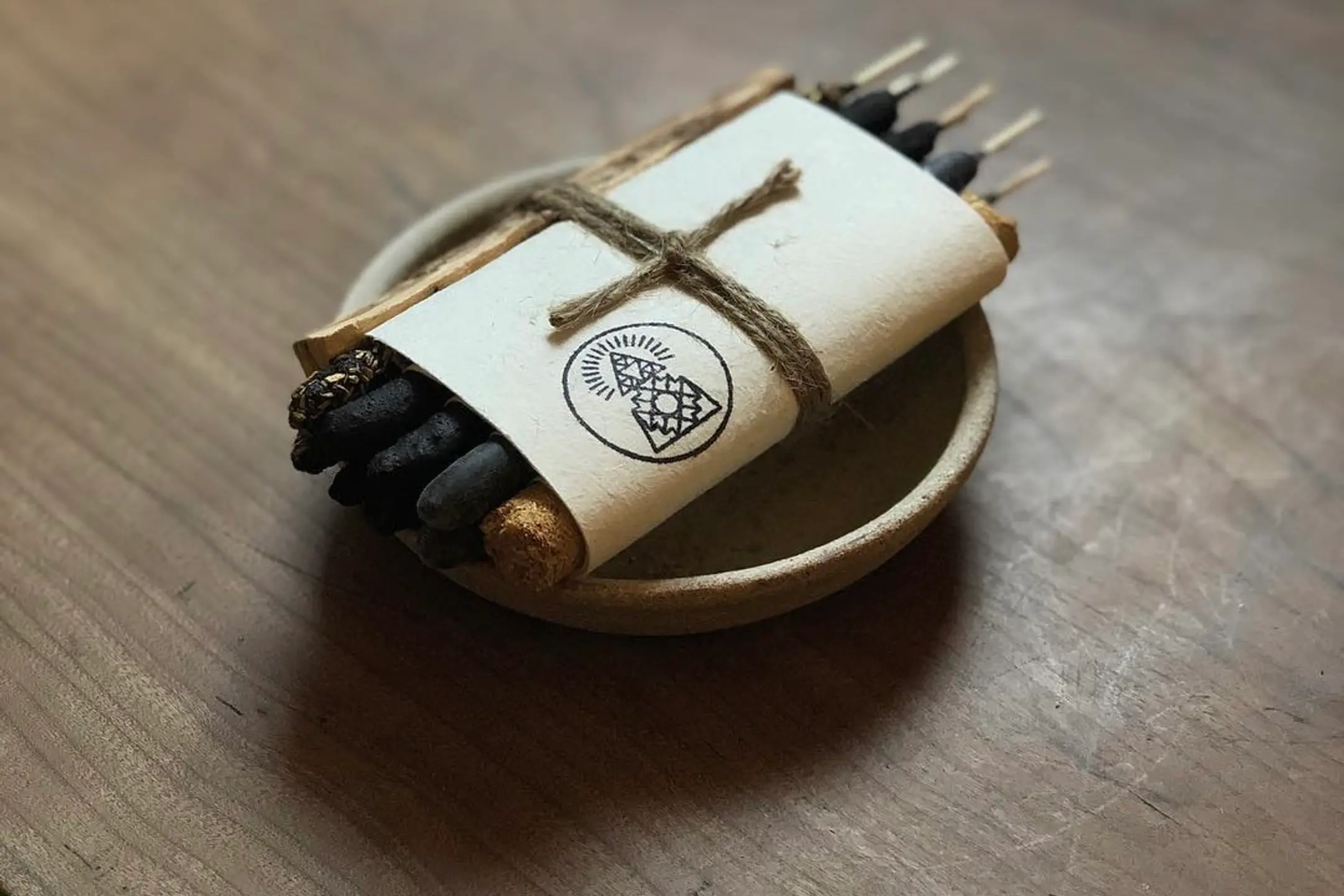 Incausa sampler bundle on a ceramic dish on a wooden table