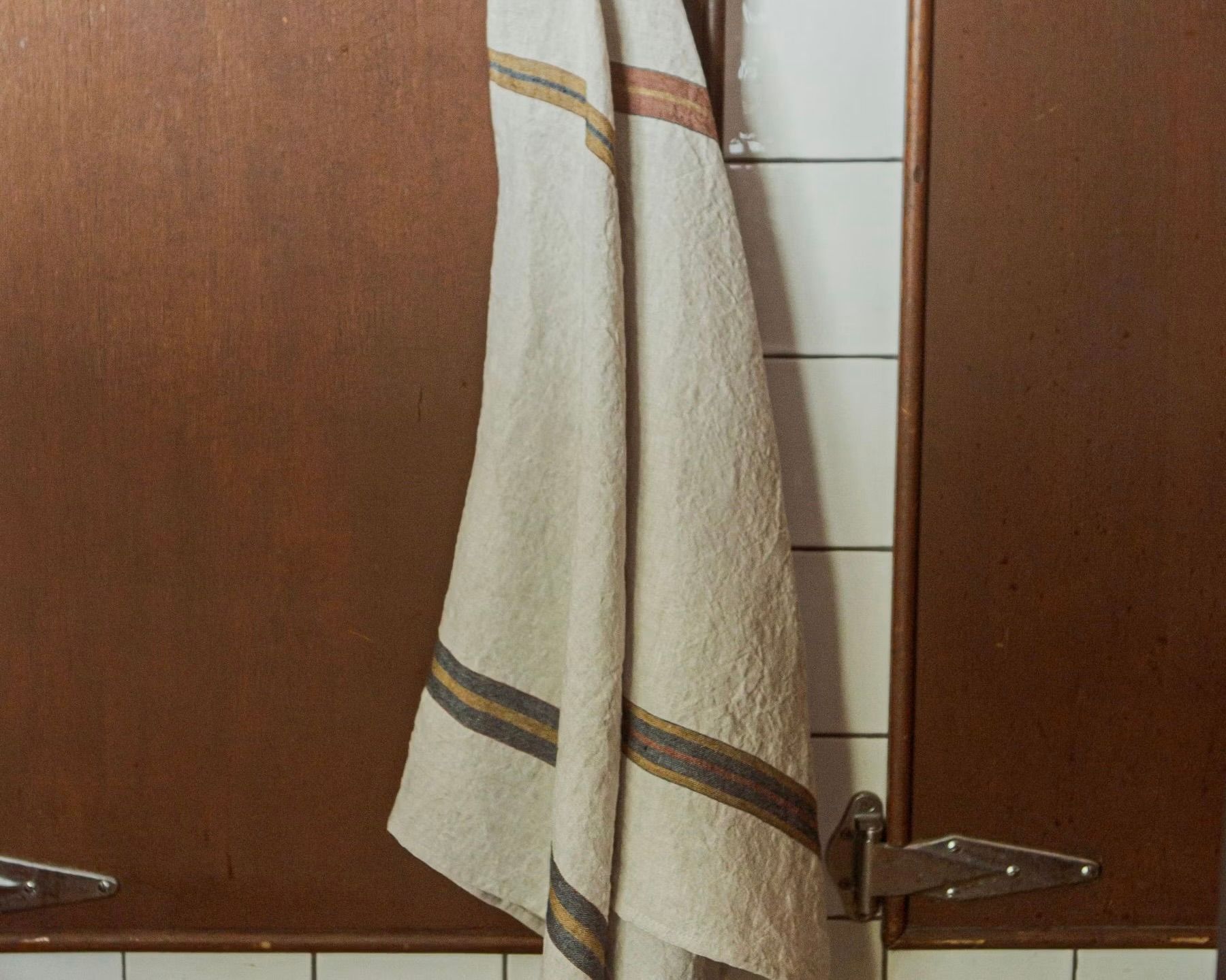 Two belgian linen tea towels from Libeco made from premium linen with stripe detailing on a cream background 
