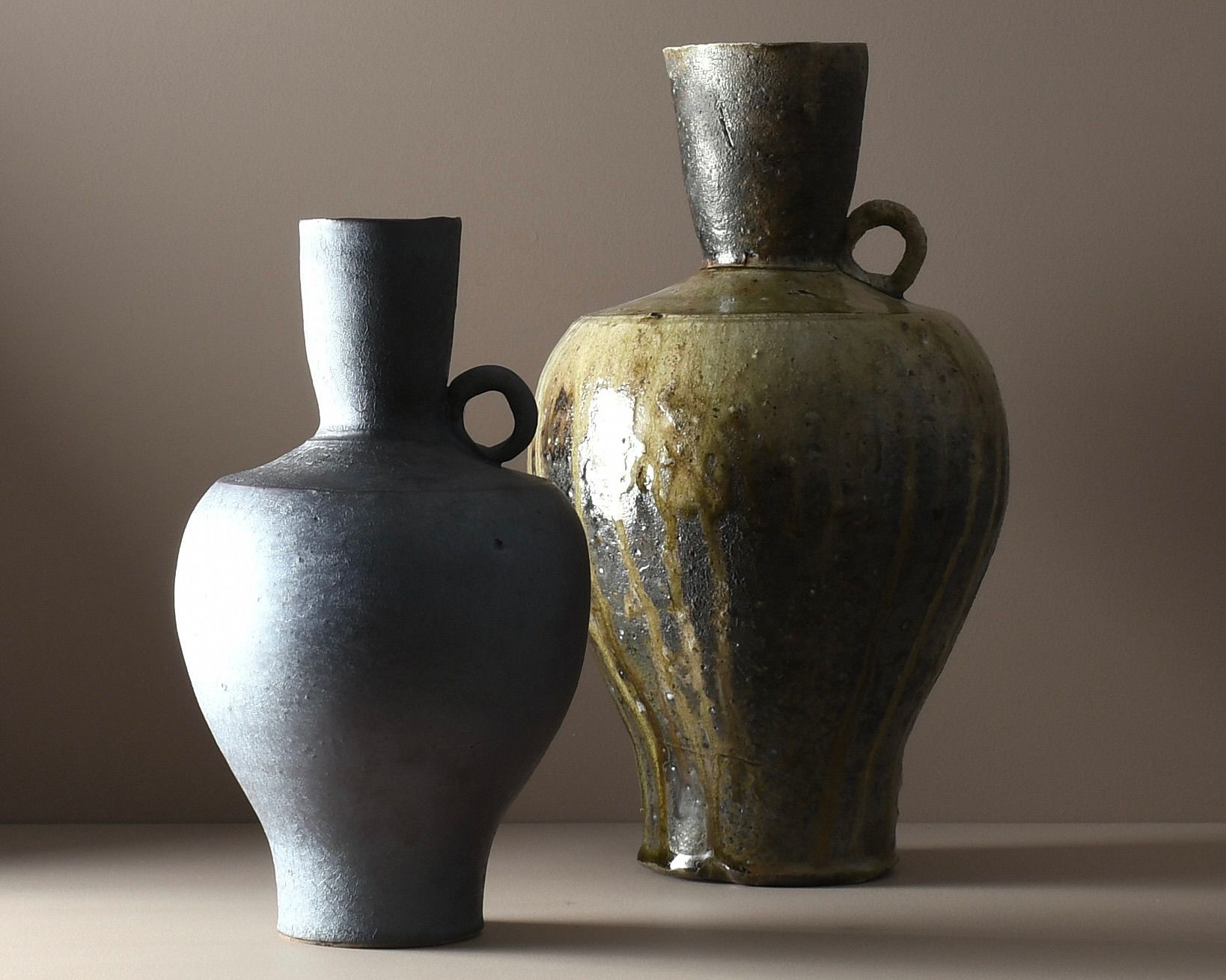 A one-of-a-kind fluted stoneware vase by Aotearoa ceramic artist Holly Rose Morgan, glazed with silt collected in the aftermath of Cyclone Gabrielle in Te Matau a Māui, Hawke’s Bay.