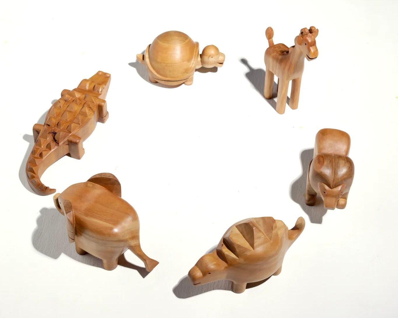 A collection of hand carved Animals by Courtney Petley, made with native timber
