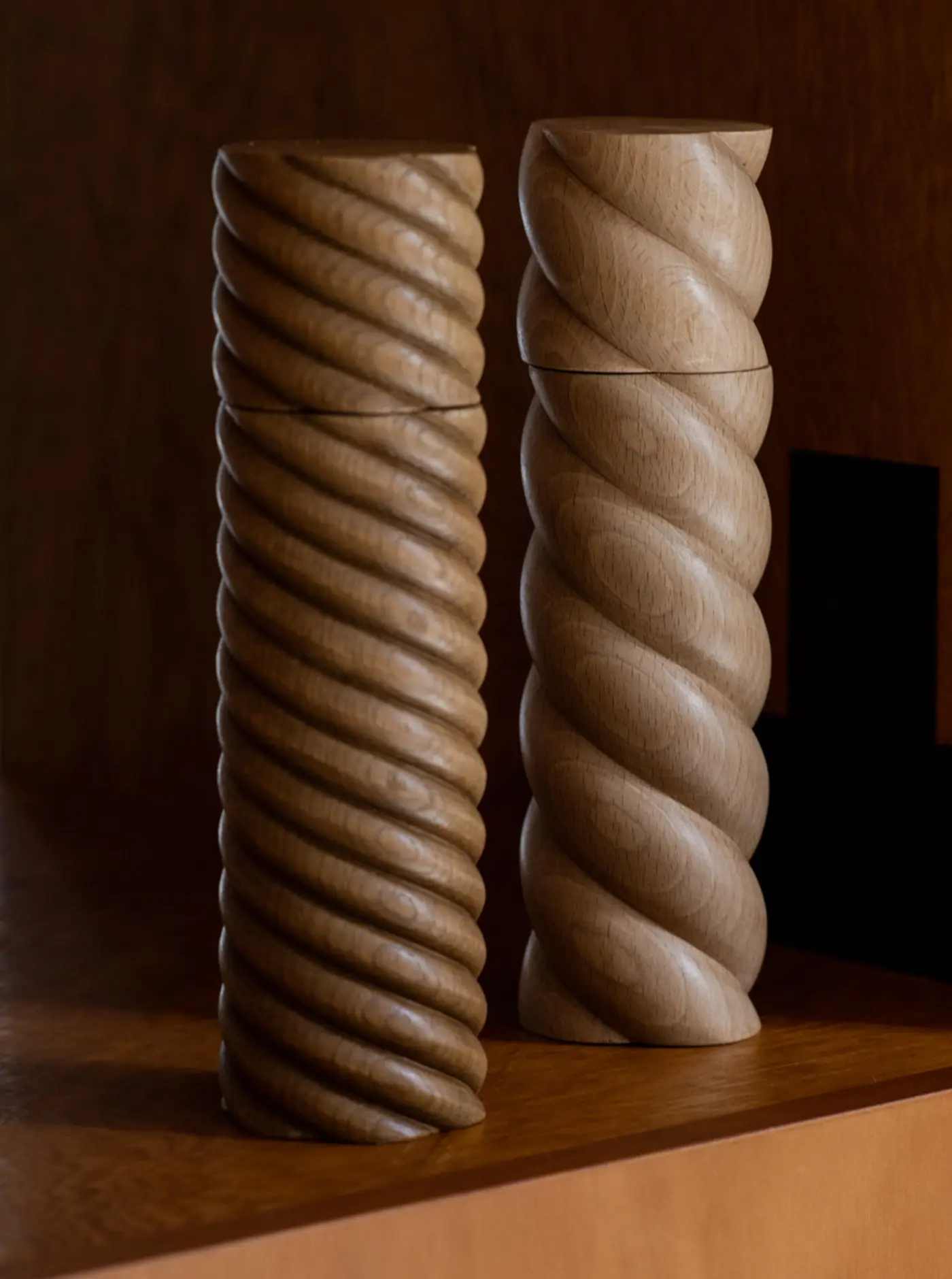 OROS Torsade Oak and Beech Salt & Pepper Mills on a wooden table