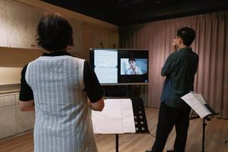Leon Hong gives singing and acting workshops remotely