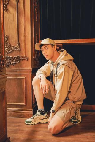 Leon Hong modelling in a sporty outfit