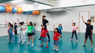 Leon Hong gives dancing class to children in Kaohsiung Taiwan