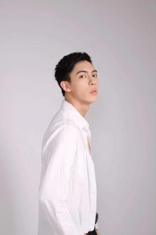 Leon Hong taking headshots in a grey studio