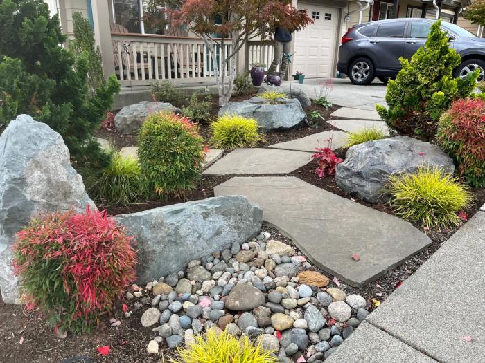 Dramatic boulder rock outcropping in a residential landscape