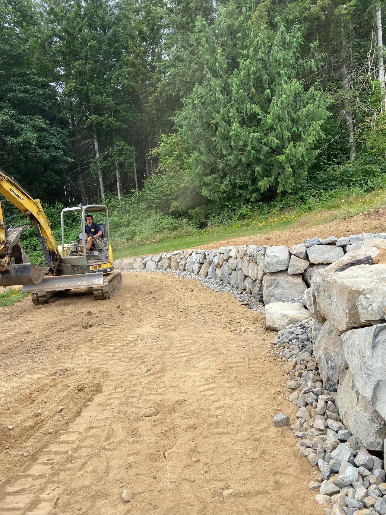 Excavation work for landscape drainage project